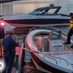 Myrtle-Beach-boat-shooting-scene-with-law-enforcement-securing-the-vessel-and-emergency-responders-assisting-victims-on-water.